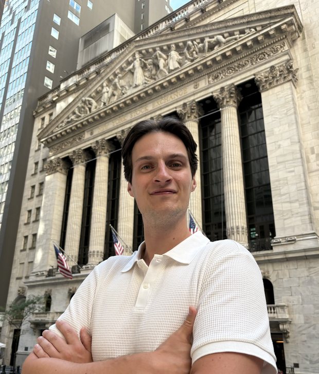 Piotr Ganski, founder and CEO of PMG Services, outside the New York Stock Exchange